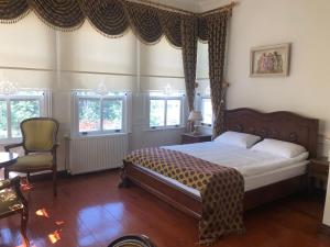 Postel nebo postele na pokoji v ubytování Çalıkuşu Tarihi Beşevler