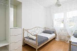 Postel nebo postele na pokoji v ubytování Apartman Regius White
