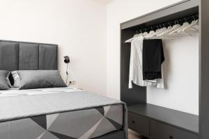 Postel nebo postele na pokoji v ubytování Apartman Regius White