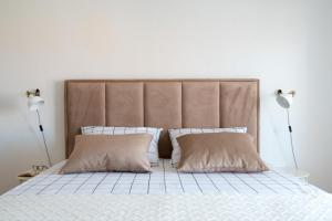 Postel nebo postele na pokoji v ubytování Apartman Regius White