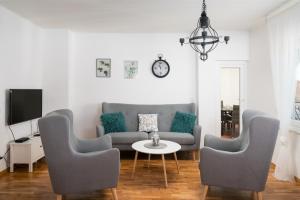Posezení v ubytování Apartman Regius White