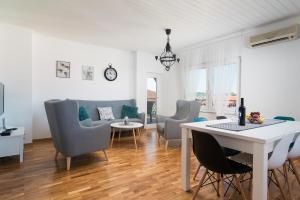 Posezení v ubytování Apartman Regius White