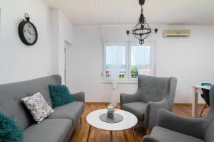 Posezení v ubytování Apartman Regius White