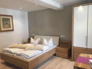 Postel nebo postele na pokoji v ubytování Appartement & Pension Schmidt Kosma