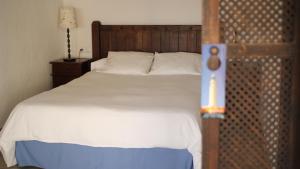 A bed or beds in a room at Habitaciones Sajorami Beach Még 26 kép