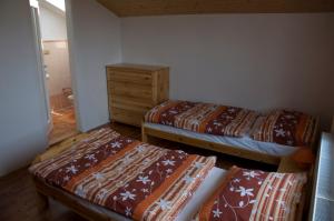 Giường trong phòng chung tại Privat Liska