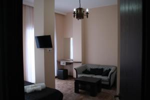 TV a/nebo společenská místnost v ubytování Hotel Delisi