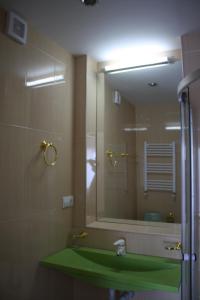 Koupelna v ubytování Hotel Delisi