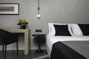 Ein Bett oder Betten in einem Zimmer der Unterkunft Azur Suites