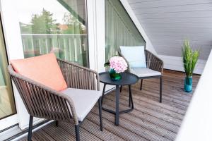 Balkón nebo terasa v ubytování Bude54