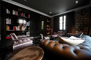 Posezení v ubytování Hotel Odette en Ville