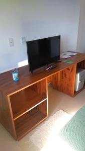 TV a/nebo společenská místnost v ubytování Pouso Alcantara