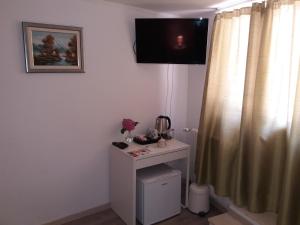 TV a/nebo společenská místnost v ubytování Flower Double Room SPLIT - Dugopolje + 18 fotografií