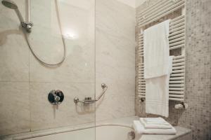 Koupelna v ubytování Hotel Porta Felice & Spa