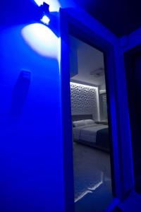 Posteľ alebo postele v izbe v ubytovaní Petite Palace Aristotelous 3
