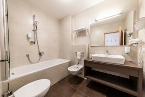 Vannituba majutusasutuses Hotel Rommisa