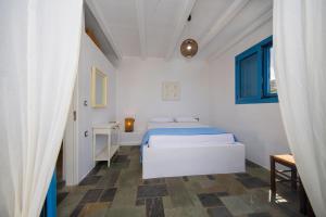 Posteľ alebo postele v izbe v ubytovaní Pontoria Stegna Studios