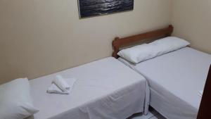 Postel nebo postele na pokoji v ubytování Pousada da Orla
