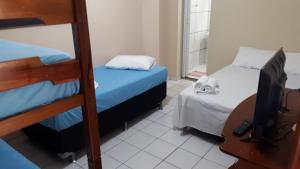 Postel nebo postele na pokoji v ubytování Pousada da Orla