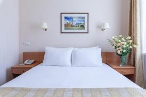 
Кровать или кровати в номере Гостиница Турист
