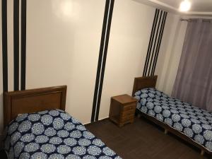 Voodi või voodid majutusasutuse Appartement Wynwood 3 toas