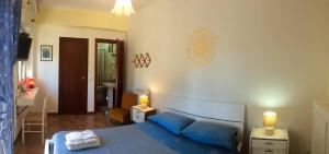 Ένα ή περισσότερα κρεβάτια σε δωμάτιο στο La Zagara