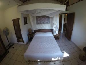 Postel nebo postele na pokoji v ubytování Casa Aditi
