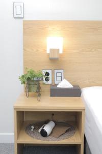 Gulta vai gultas numurā naktsmītnē Line Hotel Myeongdong