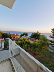 a balcony with a view of the ocean at Chez Vous in Ulcinj