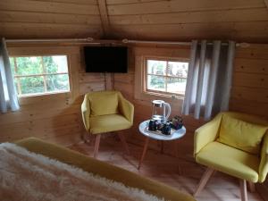 A seating area at Camping Loisirs Des Groux