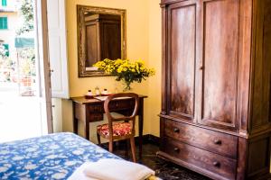 Postel nebo postele na pokoji v ubytování Hotel Il Bargellino