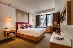 Postel nebo postele na pokoji v ubytování Concorde Hotel New York