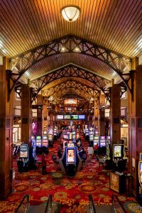 a view of a casino with many slot machines at Lady Luck Casino Black Hawk in Black Hawk
