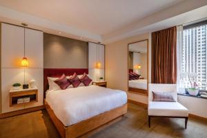 Postel nebo postele na pokoji v ubytování Concorde Hotel New York