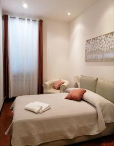 Posteľ alebo postele v izbe v ubytovaní Borgo Pio 51 Apartment Vatican