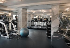 a gym with treadmills and cardio machines at The Peninsula Beverly Hills in Los Angeles