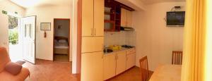 Kuchyň nebo kuchyňský kout v ubytování Apartments Nautic