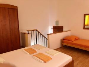 Postel nebo postele na pokoji v ubytování Apartments Nautic