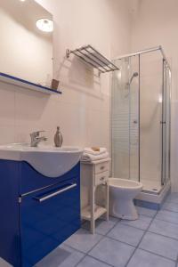 Koupelna v ubytování B&B Posidonia + 53 fotografií