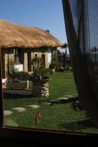A garden outside Habitaciones Sajorami Beach