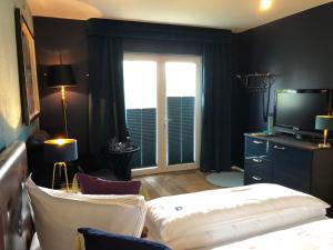 Ein Bett oder Betten in einem Zimmer der Unterkunft Haus Grünewald Unsleben