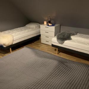 Krevet ili kreveti u jedinici u okviru objekta Høyanger 3 roms leilighet