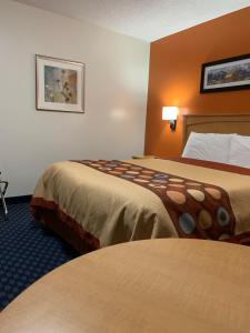 Postel nebo postele na pokoji v ubytování Westway Inn Motel