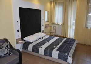 Postel nebo postele na pokoji v ubytování Studio Villa Park Premium