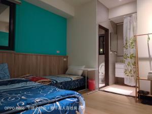 Postel nebo postele na pokoji v ubytování 禾心居He Xin Ju Homestay