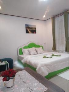 Postel nebo postele na pokoji v ubytování Pon Resort