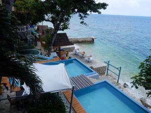 A view of the pool at Oslob Seafari Resort or nearby