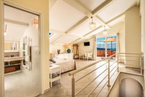 a room with a view of a bedroom at Casa Rosada in Massa Lubrense