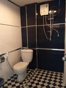 Koupelna v ubytování Pimpimarn Hotel