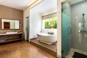 Koupelna v ubytování Annupuri Villas Bali